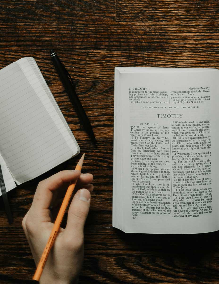 Overhead photo of a desk with a Bible open